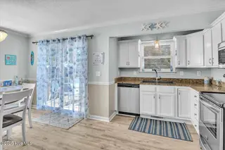 135 NE 36th Street, Oak Island, NC 28465 – photo 17: 11-Final 135 NE 36th St OKI-RJREM-7026