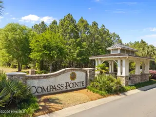 8256 Ibis Point NE, Leland, NC 28451 — 4-bedroom home in Compass Pointe, Leland, NC, photo 3 of 75: 14-web-or-mls-DJI_20260417144551_0985_D