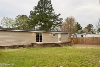 4905 Hunting Ridge Road NW, Wilson, NC 27896 — 3-bedroom manufactured home in Windemere, Wilson, NC, photo 14 of 16: Back of Home