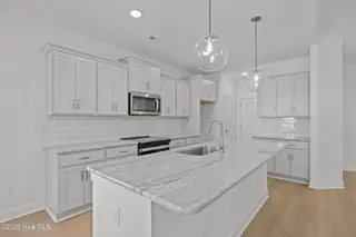4503 Village Green Drive SW Homesite 91, Shallotte, NC 28470 — 3-bedroom home in Village Green SHLTE, Shallotte, NC, photo 16 of 49: 15_kitchen
