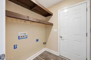 106 Heckathorne Drive, New Bern, NC 28560 — 3-bedroom home in West Crossroads, New Bern, NC, photo 23 of 33: Laundry Room