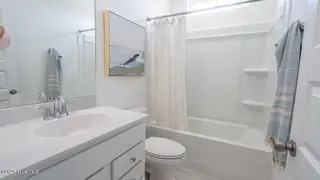 3366 Wood Stork Drive Litchfield Il Lot 41, Ocean Isle Beach, NC 28469 – photo 15: Guest Bathroom