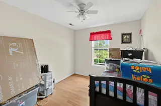 121 NE 6th Street, Oak Island, NC 28465 – photo 16: 25_121_NE_6th_St-Bedroom-GE64