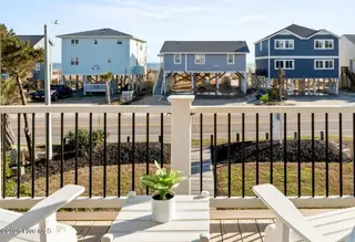 1116 E Beach Drive, Oak Island, NC 28465 – photo 17: front water