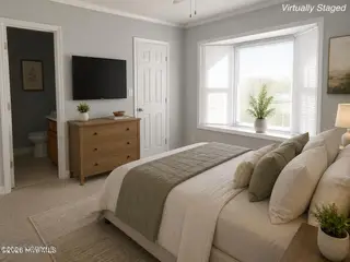 342 Haven Drive V6, Greenville, NC 27834 – photo 3: Virtually Staged Owners Bedroom