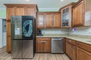 706 Daniel Lindsey Court, Sneads Ferry, NC 28460 — 3-bedroom home in Grantwood, Sneads Ferry, NC, photo 9 of 33: 17KITCHEN