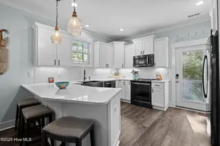 142 NW 12th Street, Oak Island, NC 28465 – photo 13: 23-web-or-mls-DSC06294