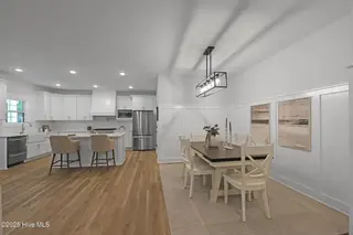 82 Northeast Drive NW, Calabash, NC 28467 – photo 7: 82NE open Dining & Kitchen areas