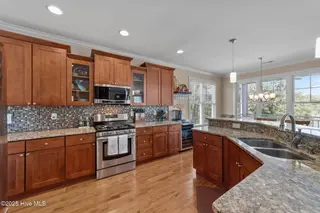 124 W Pelican Drive, Oak Island, NC 28465 – photo 16: 47-web-or-mls-CZ9A9192