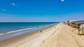 4010 E Dolphin Drive, Oak Island, NC 28465 – photo 12: 17-DJI_0Oak Island044-6kahunaphoto.com