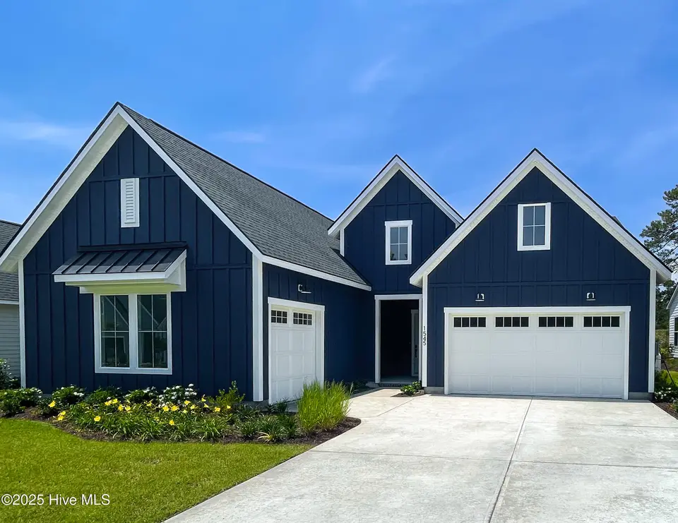 1545 St Lucia Drive SW, Shallotte, NC 28470 – photo 1 of 33: Saltmeadow Farmhouse