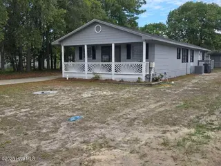 632 Live Oak Drive, Sunset Beach, NC 28468 – photo 2: 20250507_134333
