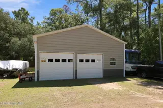 203 George Taylor Road, Newport, NC 28570 – photo 9: Huge 2 Car Garage w/ Workshop & Storage