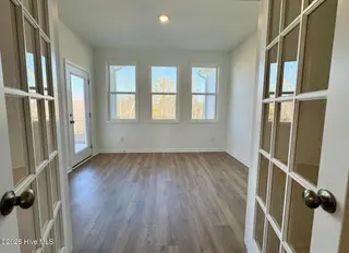 2012 Red Woodpeckers Court, Leland, NC 28451 — 3-bedroom home in Terrapin, Leland, NC, photo 9 of 23: Sunroom
