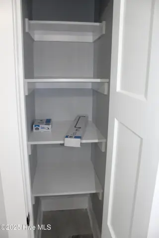 316 Bobbys Drive, Newport, NC 28570 – photo 23: master bath linen closet