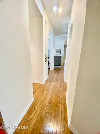 7599 Dunbar Drive SW, Sunset Beach, NC 28468 – photo 18: Hallway