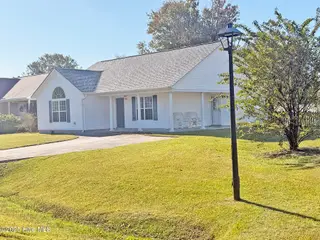 4901 N Hampton Drive SE, Southport, NC 28461 – photo 7: 4901 N Hampton SE Front Northm4