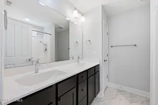 106 Heckathorne Drive, New Bern, NC 28560 — 3-bedroom home in West Crossroads, New Bern, NC, photo 16 of 33: Master Bathroom