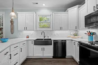 142 NW 12th Street, Oak Island, NC 28465 – photo 14: 25-web-or-mls-DSC06300