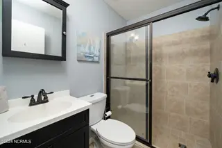 1405 Canal Drive Apt 17, Carolina Beach, NC 28428 – photo 23: 26-web-or-mls-1405 Canal Dr #17-24 copy