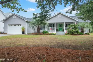 5874 Lake Joel Drive SW, Ocean Isle Beach, NC 28469 — 3-bedroom home in Crownstream, Ocean Isle Beach, NC, photo 1 of 47: 5874LakeJoelDrSW - 3