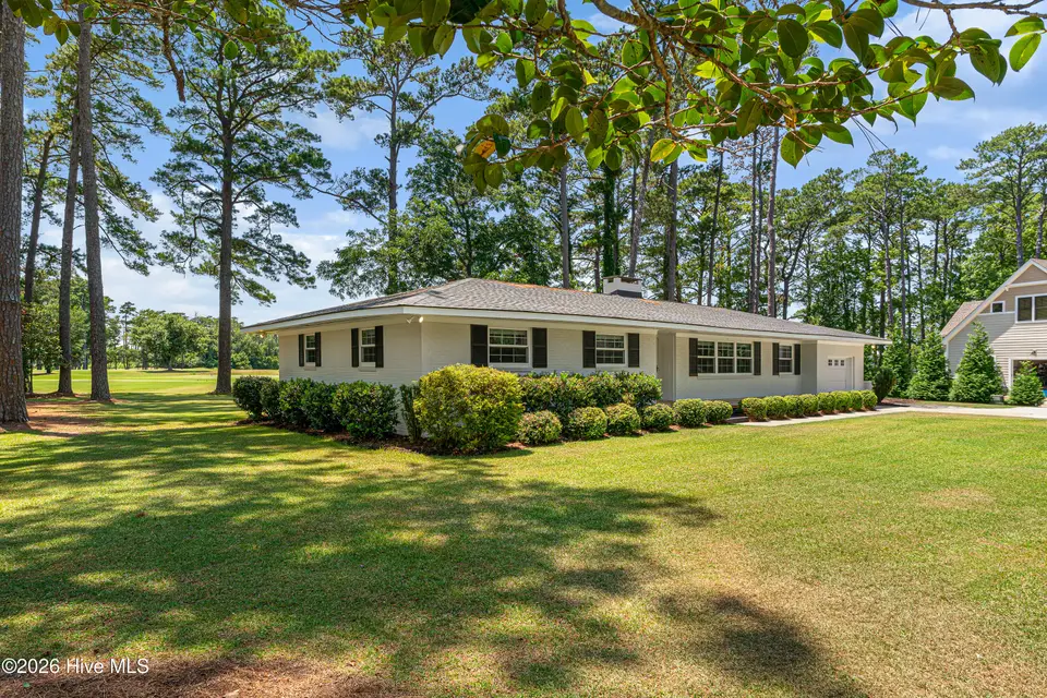 1705 River Drive, Morehead City, NC 28557 – photo 1 of 50: Stunning home on the golf course
