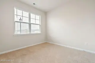 3583 Whaley Way NW, Ash, NC 28420 — 3-bedroom townhome in Brunswick Plantation, Ash, NC, photo 23 of 34: Bedroom