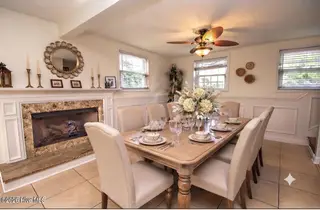310 Holly Lane, Cape Carteret, NC 28584 – photo 13: AI stage of lower level great room area