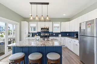 5205 E Pelican Drive, Oak Island, NC 28465 – photo 5: 22-web-or-mls-DSC06700