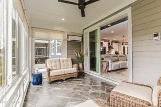 620 Eastwood Park Road 20-C, Sunset Beach, NC 28468 — 4-bedroom townhome in Sea Trail Plantation, Sunset Beach, NC, photo 21 of 63: Main Level Porch