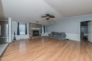 210 Creek Bank Drive, New Bern, NC 28560 — 3-bedroom manufactured home in Creekwater Haven, New Bern, NC, photo 12 of 58: LivingRoom