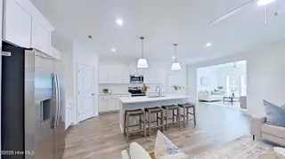 120 Edgewater Drive, West End, NC 27376 – photo 17: kitchen with view of sunroom