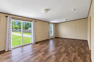 102 Bonnie Farms Road, Dudley, NC 28333 — 3-bedroom manufactured home in Bonnie Farms, Dudley, NC, photo 8 of 20: den