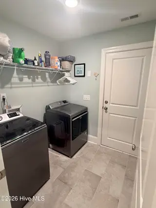 2487 Lake Ridge Drive, Southport, NC 28461 – photo 13: Laundry Room