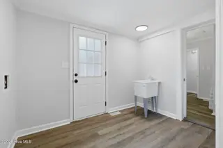 103 Puller Drive, Jacksonville, NC 28540 – photo 16: Laundry Room going into Bathroom and bac