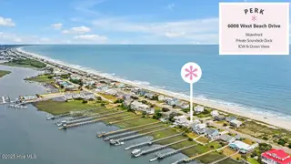 6008 W Beach Drive, Oak Island, NC 28465 – photo 3: 6008WestBeachDriveDrone-Perks