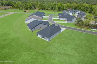 1727 Saucepan Bay Drive SW, Shallotte, NC 28470 – photo 3: Aerial View of side and rear