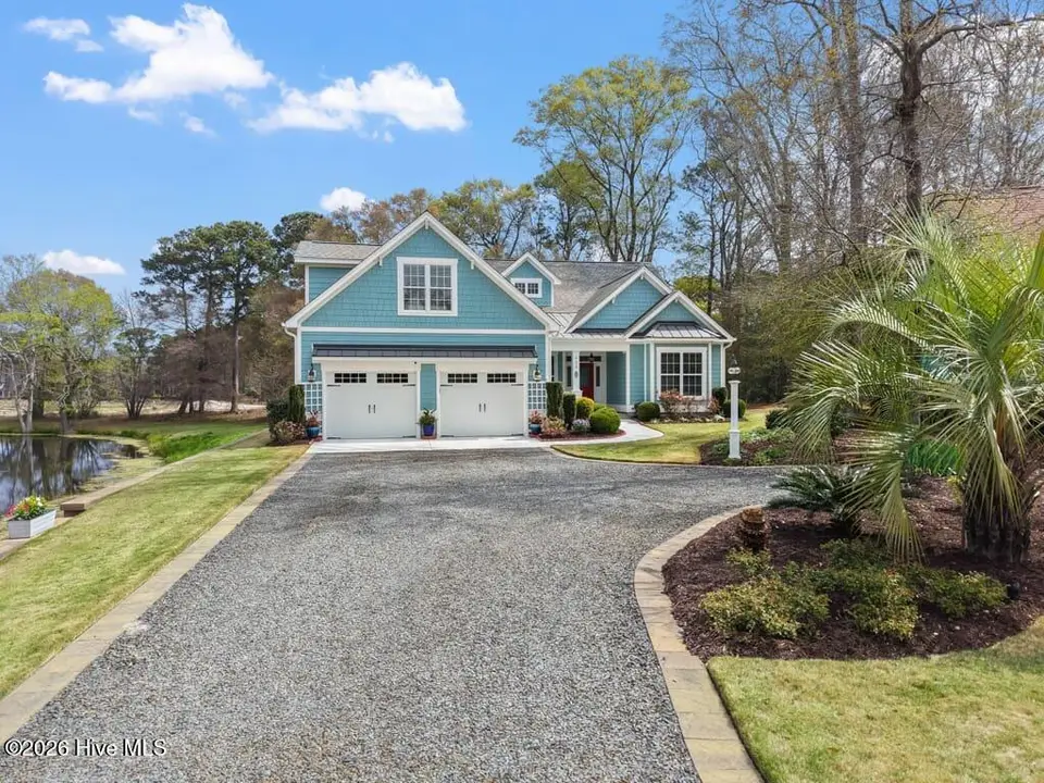 922 Oyster Pointe Drive, Sunset Beach, NC 28468 – photo 1 of 69: Front of Home