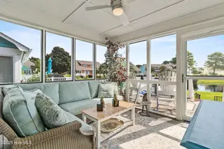 656 Settlers Lane, Kure Beach, NC 28449 – photo 17: screened porch