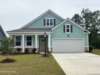 1206 Woodhouse Drive NW, Ash, NC 28420 – photo 1: Lot 25 - 1206 woodhouse drive