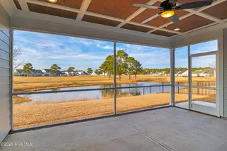 111 Windswept Lane, Beaufort, NC 28516 – photo 4: Screened Porch Overlooking Golf Course