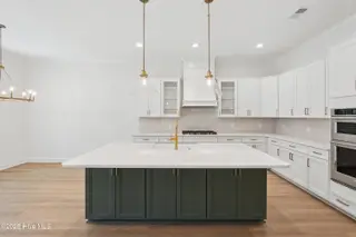 1560 St. Lucia Drive SW, Shallotte, NC 28470 – photo 5: Kitchen with expanded island