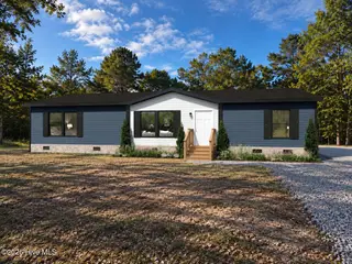 490 Wineview Court SE, Bolivia, NC 28422 — 5-bedroom manufactured home in Vineyard Landing, Bolivia, NC, photo 1 of 4: Front
