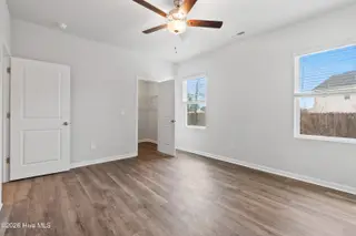 1067 Hanson Drive, Leland, NC 28451 – photo 15: 14-Primary Bedroom with Walk-in Closet