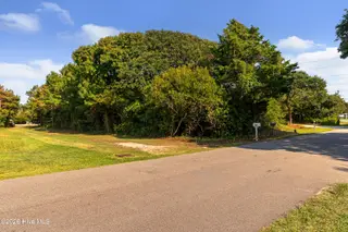 104 Juniper Road, Pine Knoll Shores, NC 28512 – photo 5: Vacant lot in Pine Knoll Shores