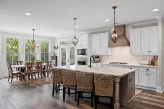 3997 Wyndmere Drive, Southport, NC 28461 – photo 13: Chef's Kitchen and Dining Area