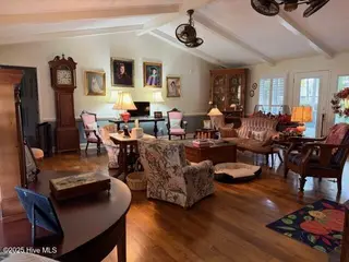 552 Woodfield Road, Whiteville, NC 28472 – photo 7: Family room from dining