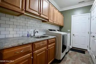 129 Beacon Ridge Drive, West End, NC 27376 – photo 24: Laundry - New Granite Counters