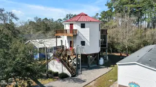 233 NE 75th Street, Oak Island, NC 28465 – photo 2: 233NE75thStreetDrone-1