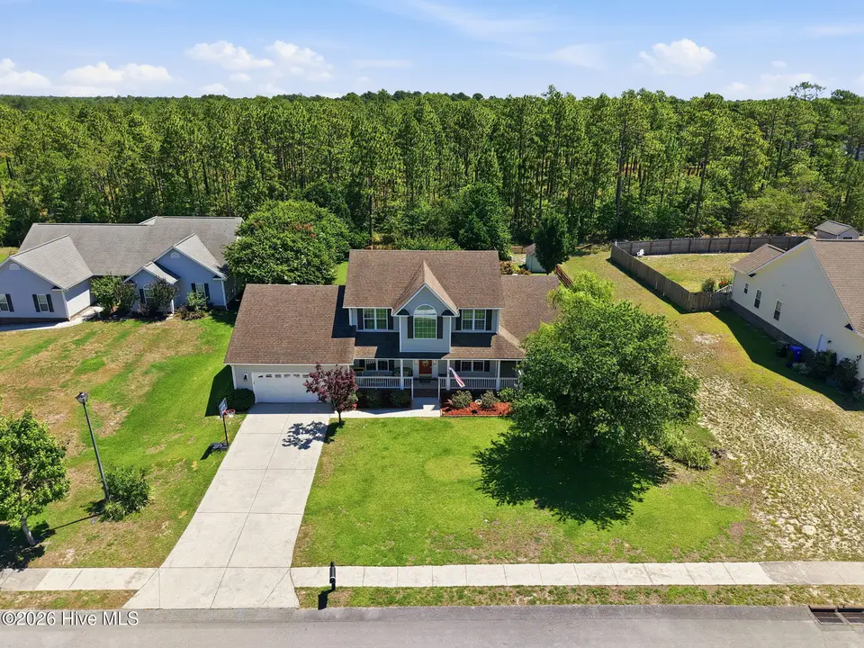 135 Tifton Circle, Cape Carteret, NC 28584 – photo 1 of 43: 28-web-or-mls-DJI_20260624113125_0270_D_